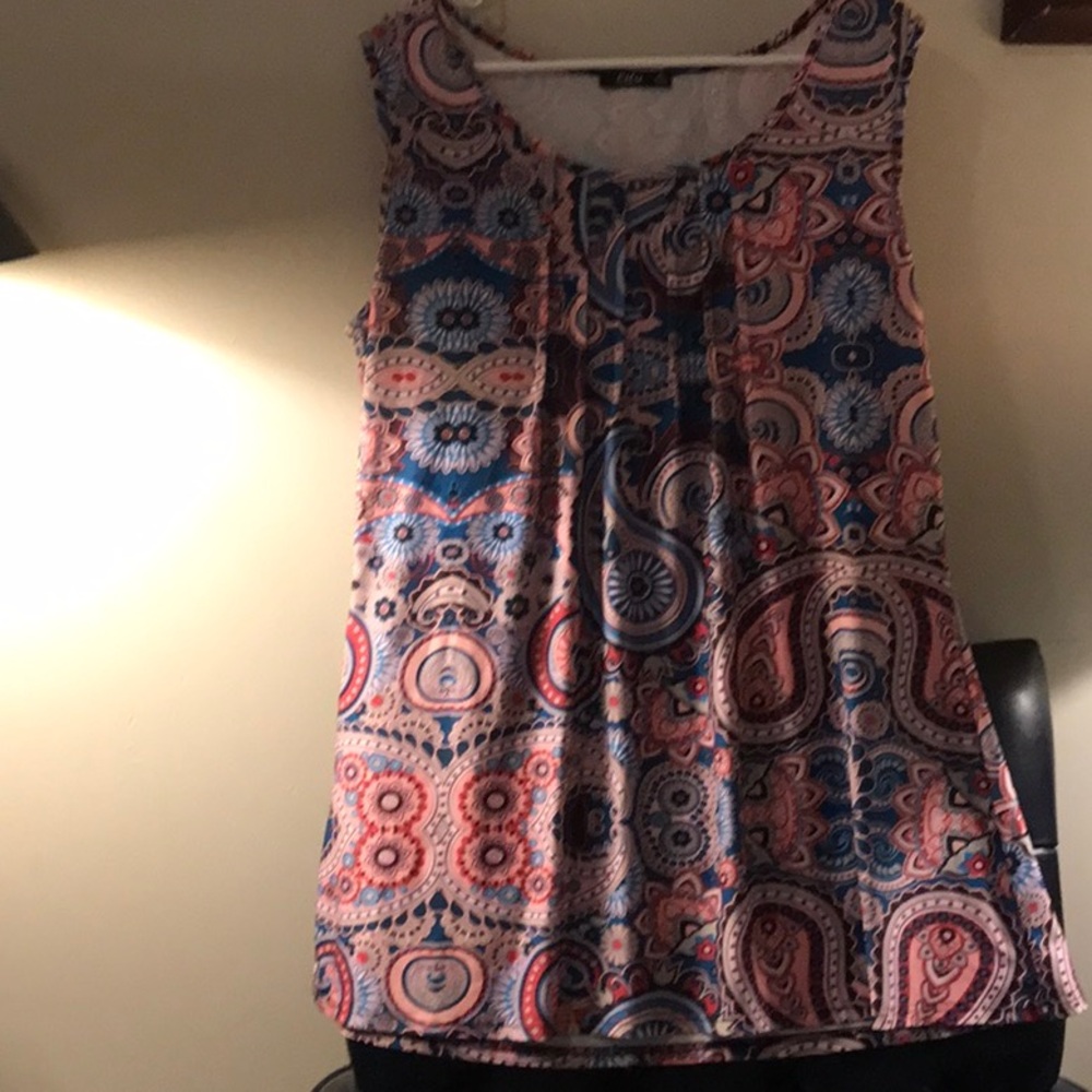 Lilly by Firmiana makes this beautiful top. Size XL. NWOT!